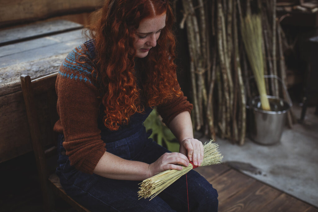 Rosa Harradine making a brush in her workshop in Wales photo credit Heather Birnie